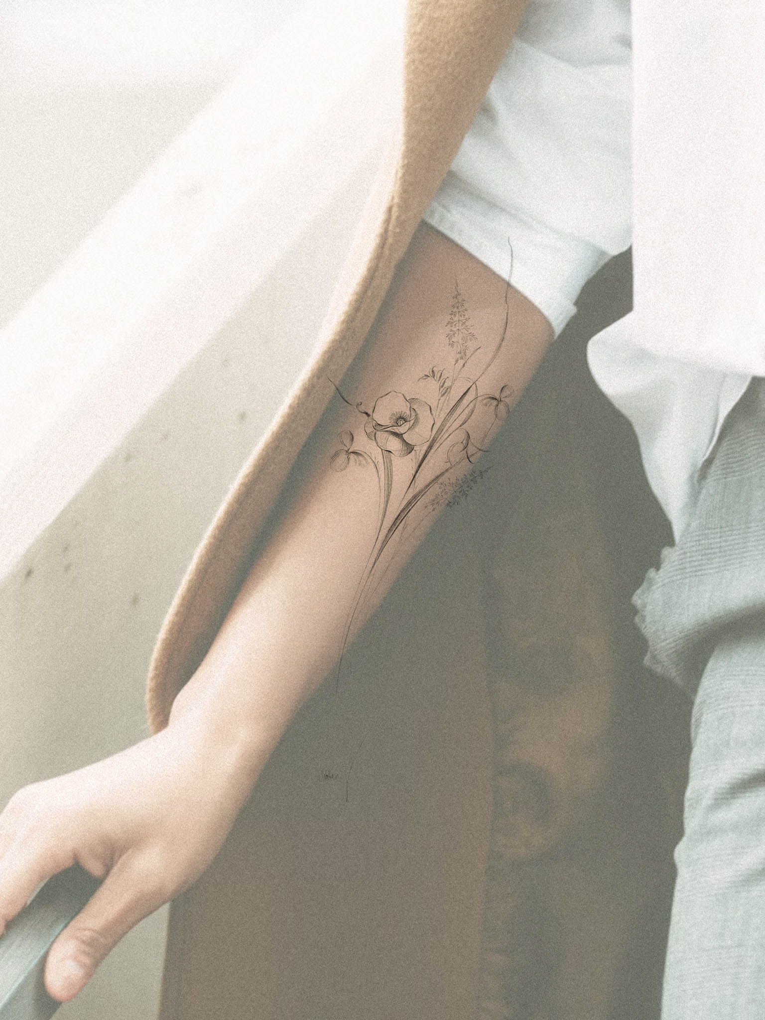  Elegant Minimalist Botanical Tattoo Design