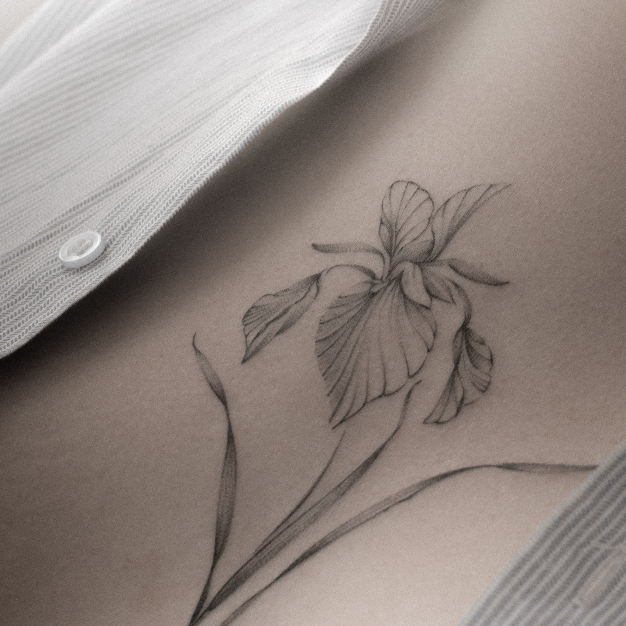  Delicate flower tattoo Amsterdam 